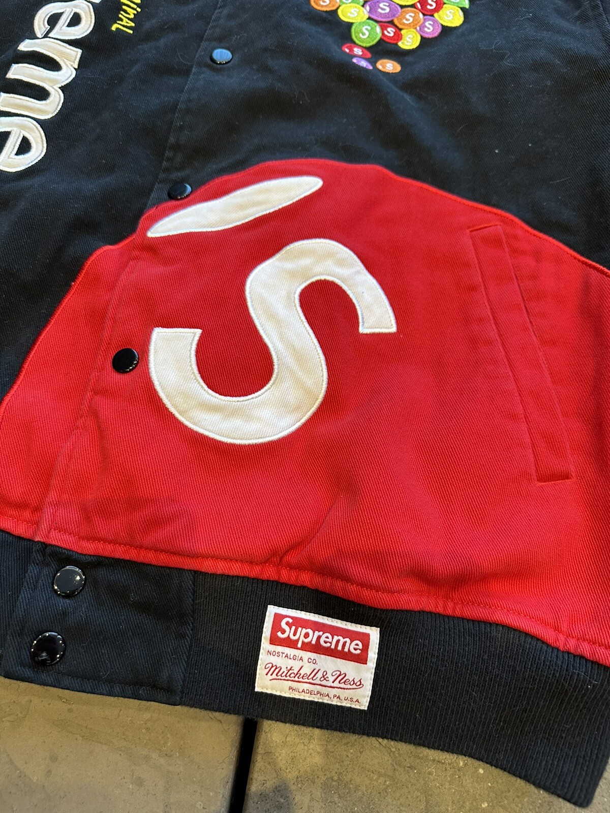 Supreme Skittles Mitchell & Ness Varsity Jacket BlackSupreme Skittles  Mitchell & Ness Varsity Jacket Black - OFour