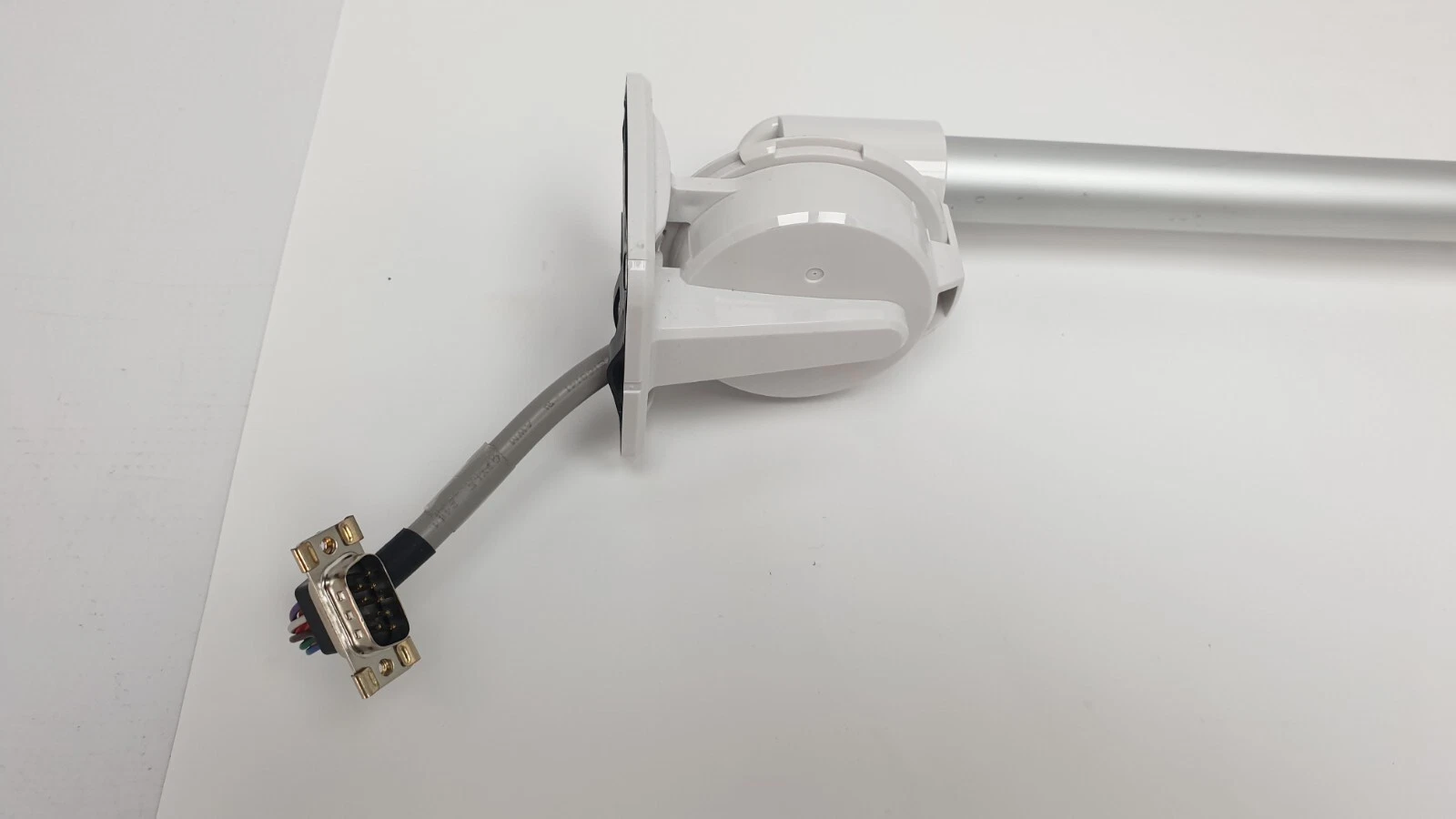 Patlite folding wall bracket with the cable exiting to a 9-pin D-sub connector