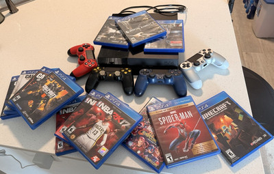 Sony PlayStation 4 Console with 4 Controllers & Games 