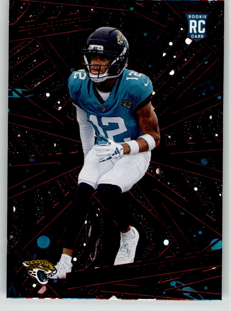 Travis Hunter 2025 Panini Revolution Red Cosmo 242 Jacksonville Jaguars Rookie