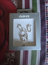New 4 Silver Rings/Earring Set from Claire's