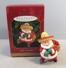 1999 Hallmark "Feliz Navidad" Santa Wearing Sombrero Ornament - QX6999