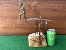 C. JERE SCULPTURE OF A BOY ON DIVING BOARD