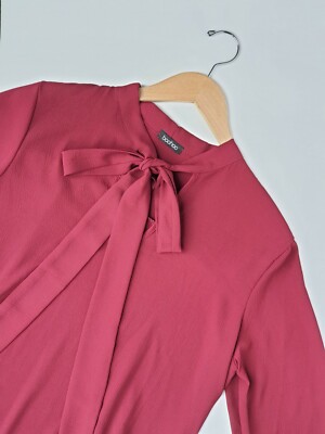 boohoo pink bow dress Boohoo Bow Back Mini Skater Dress, $39 | Asos