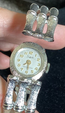 VTG Sheffield Lady's Cuff Peek A Boo Watch Bracelet Silvertone. S