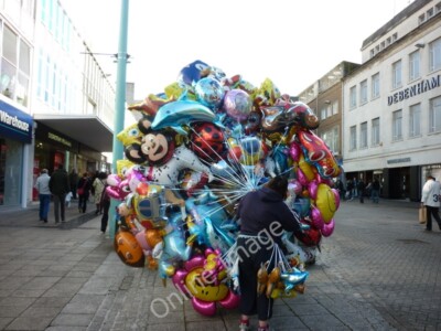 Photo 6x4 Selling balloons on a windy day Plymouth  c2010