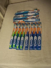 12 new in package oral - b complete advantage deep clean 35 tooth brushes