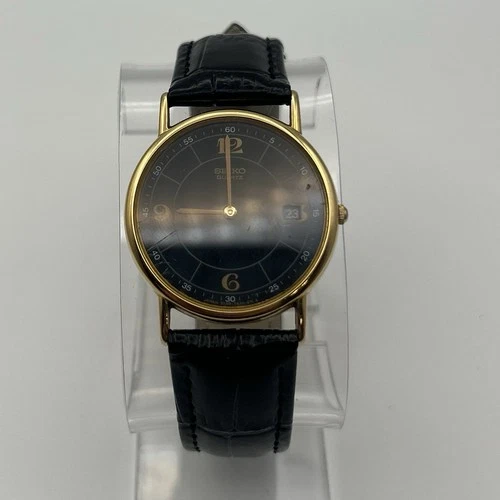 Vintage Seiko 5Y39-7010 Quartz Black Dial Gold Tone Date Men's Dress Watch 31mm