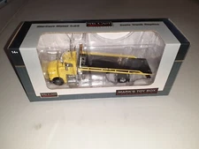 NIB 1/64 Custom Yellow Pete 385 Rollback Tow Truck SpecCast