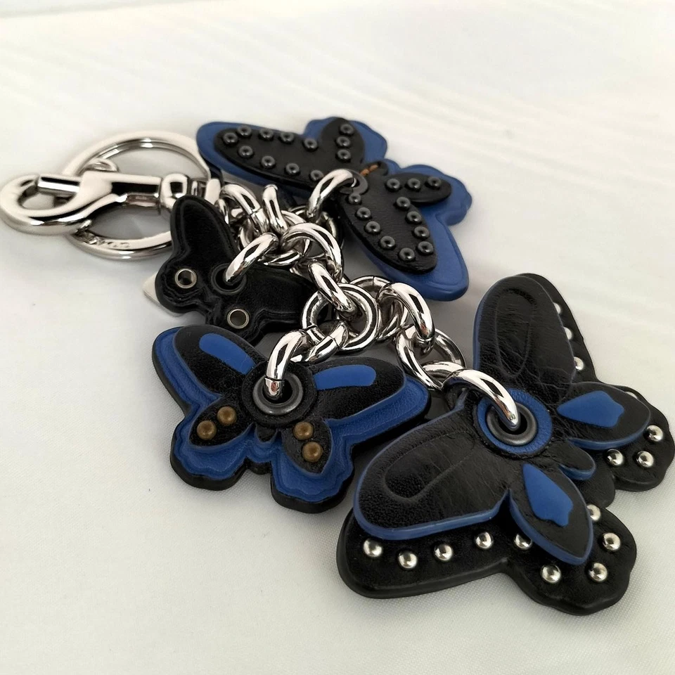 COACH Dije Mariposa Cuero Azul Llavero Dije Mariposa Silueta Foto 4 de 4