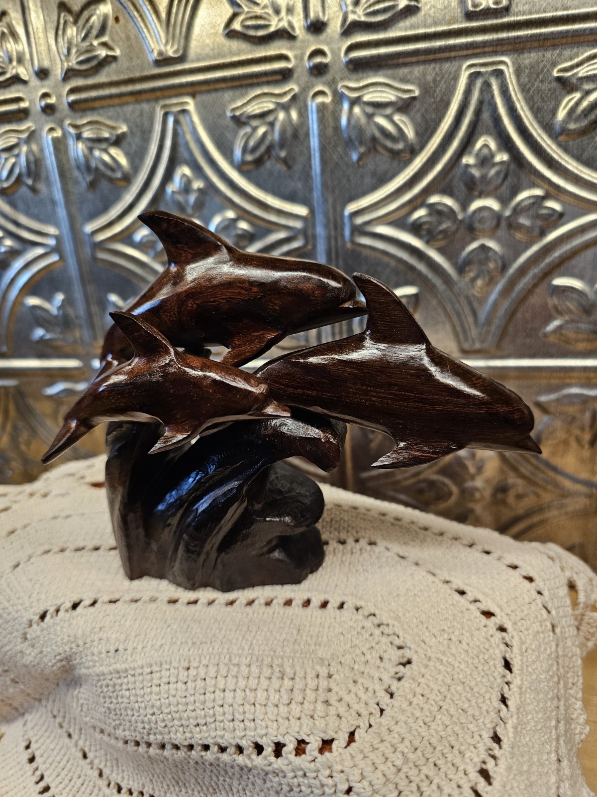 Trio Of Dolfins Riding A Wave, Ironwood Statue