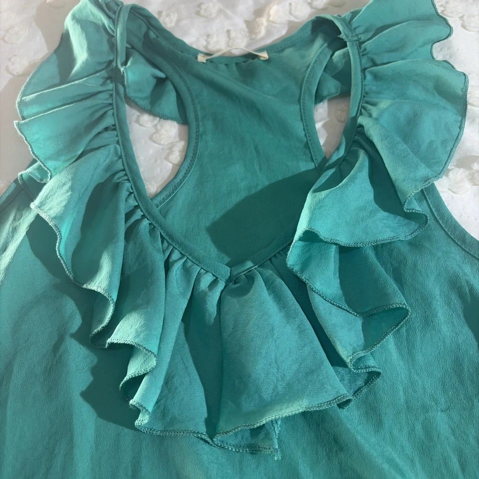 Blusa exuberante mujer talla grande sin mangas con volantes verde liso elástica Foto 2 de 4