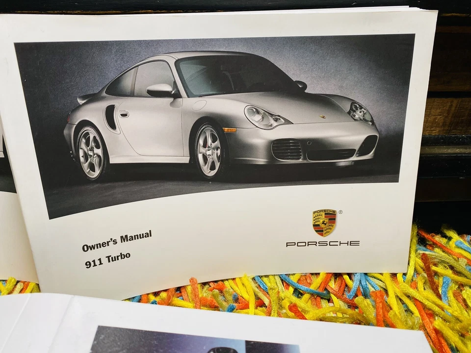 NUEVO⭕️ PORSCHE 911 TURBO 2003 SOLO MANUAL DEL PROPIETARIO + FUNDA DE PLÁSTICO NUEVO STOCK ANTIGUO Foto 2 de 4