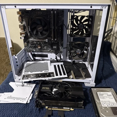 Corsair mid-tower case, white, and used GeForce RTX 2060, in good condition.