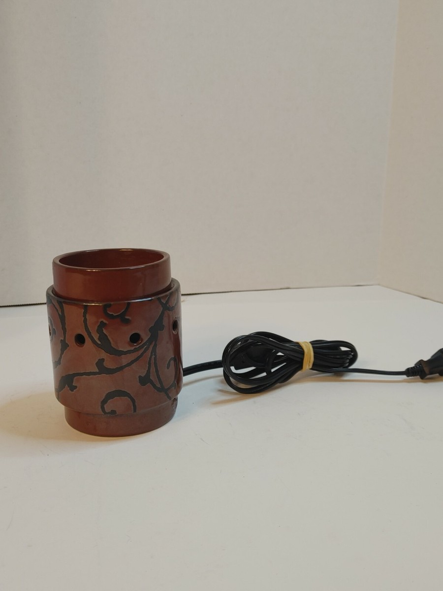 Lava Colored Scentsy Warmer With Swirl Pattern. Model MSW