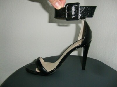 schwarze High Heels mit Plateau und Reptilprägung