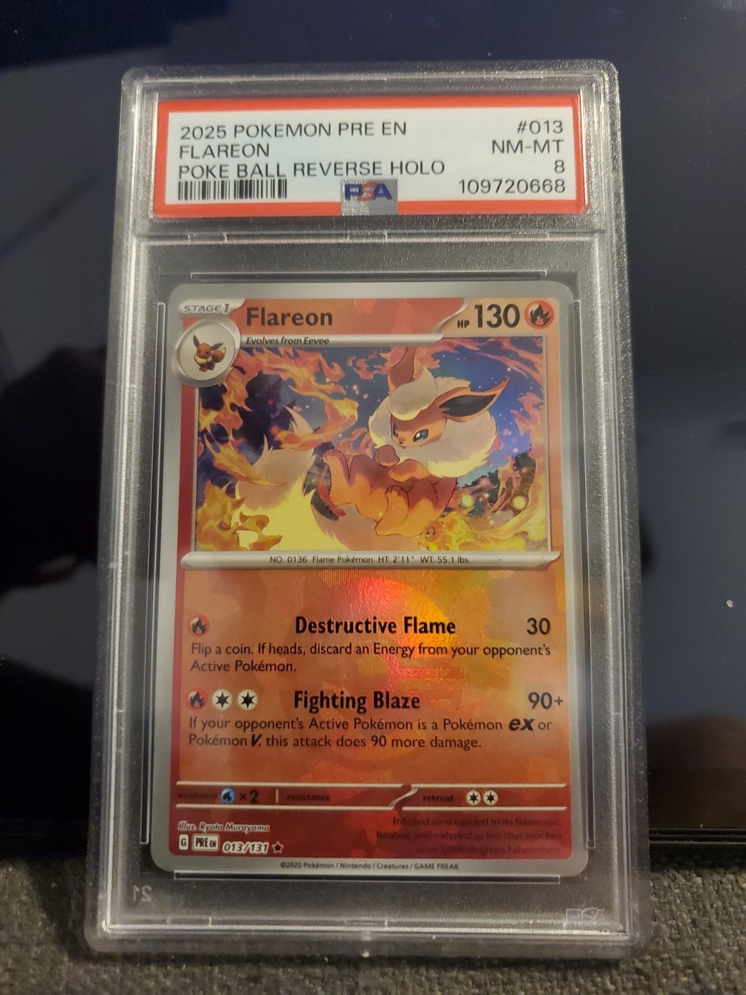 Pokemon Prismatic Evolutions Flareon 013/131 Pokeball Reverse Holo PSA 8