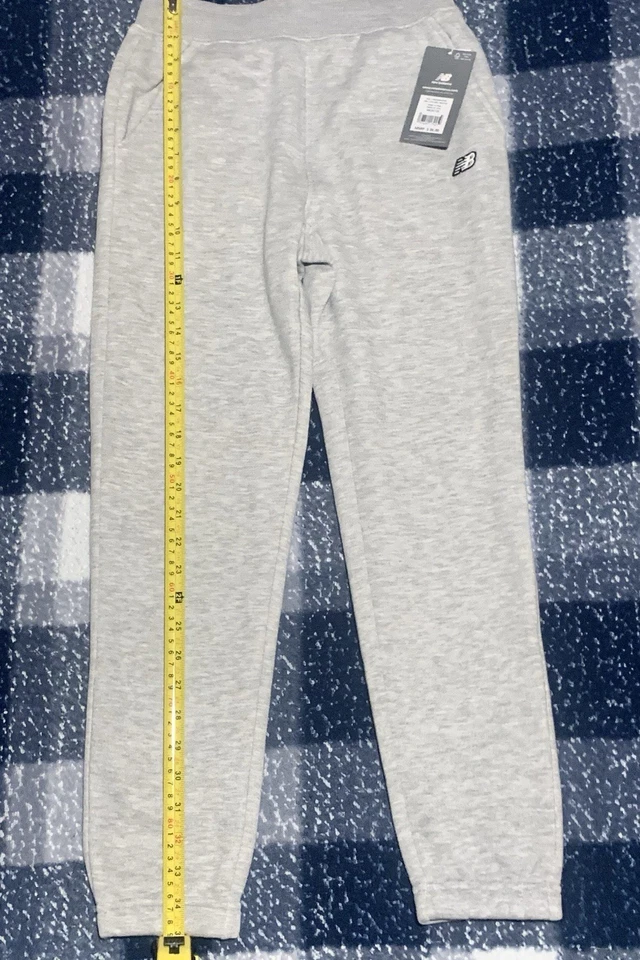 Pantalones deportivos New Balance ATH gris jaspeado Foto 2 de 4