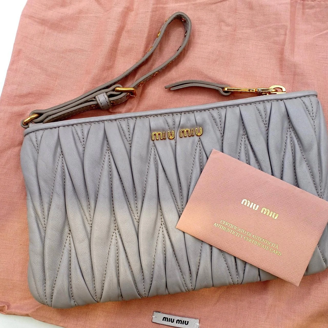 Miu Miu — miumiu greige matelasse clutch bag