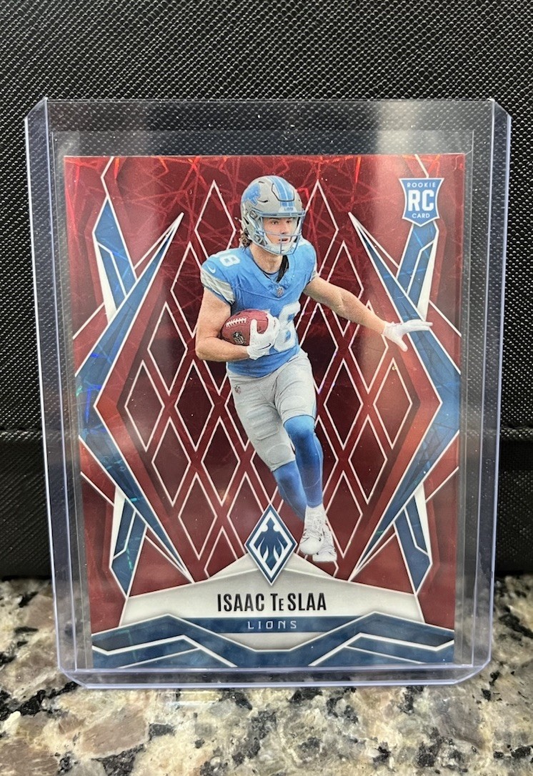 2025 Panini Phoenix - Rookies Isaac Teslaa #189 Red Laser /199 (RC)