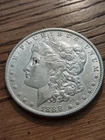 1888-P MORGAN SILVER DOLLAR IN EX/FINE CONDITION
