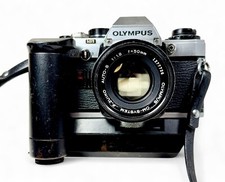 Olympus OM 10 SLR Film Camera w/ Olympus Zuiko10 50mm f 1.8 Lens  Auto Winder 