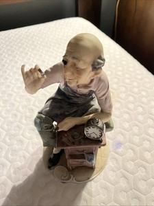 Vintage Porcelain Clockmaker Figurine Man at Work Making Timepiece Watch 7.5”