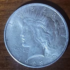 1928 - P PEACE SILVER DOLLAR
