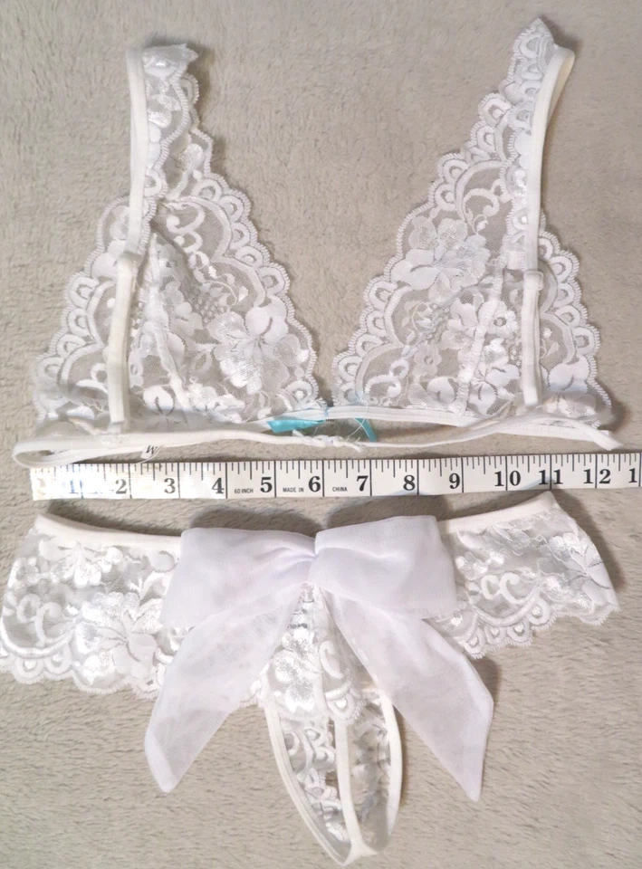 Conjunto de sujetador transparente y bragas con tanga Leg Avenue para mujer talla S/M Foto 3 de 3