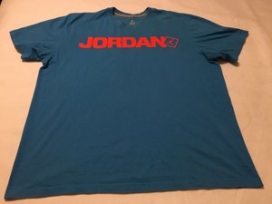 blue and orange jordan shirt