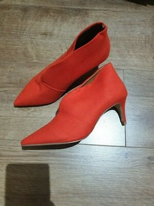 red heeled boots uk