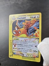 POKEMON CHARIZARD/ GLURAK HOLO 146/144 SKYRID...