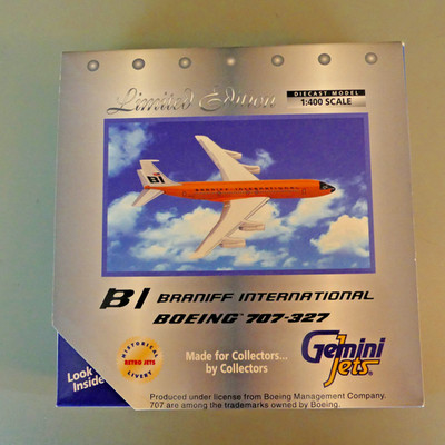 Braniff Airlines Boeing 707 by Gemini Jets, 1/400 scale, orange.