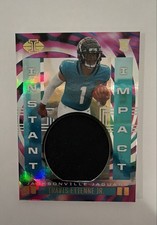 2021 Panini Illusions - Instant Impact Travis Etienne #II-TE (MEM, RC)