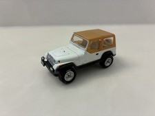 Greenlight North Shore White 1987 Jeep Wrangler Unlimited 4x4 Soft Top YJ