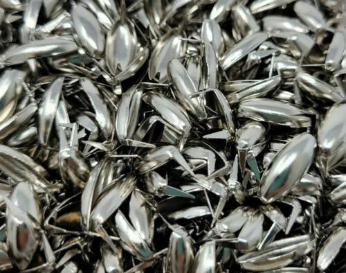 Broches, ribetes y tachuelas de artesanía en piel color principal plata