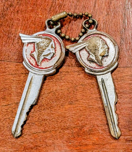 Cool Pair Vintage Pontiac Indian Crest Key Blanks 1935-1966
