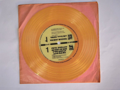Pete Shelley / Animal Magnet   Qu'est-Ce Que C'est Que Ça / Amor - 7'' Flexidisc