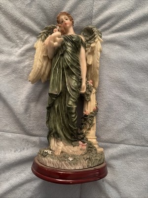 Vintage Angel guardian Holding a child Figurine 11in