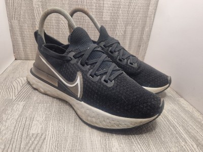 Nike Damen React Infinity Run Flyknit schwarz weiß & gold UK Größe 4,5 