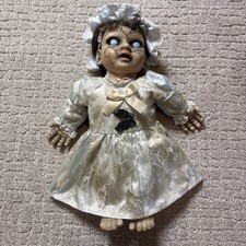 Spirit Halloween Decrepit Haunted Doll Talkin...