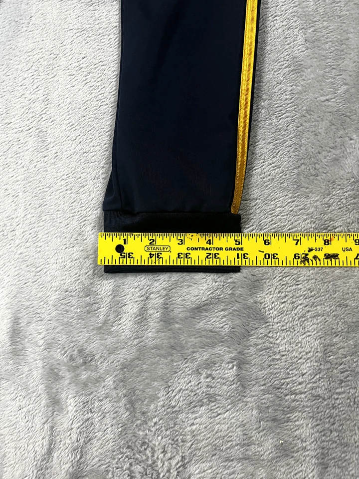 Pantalones deportivos Adidas talla grande azul marino con rayas doradas usados en excelente estado Foto 2 de 4