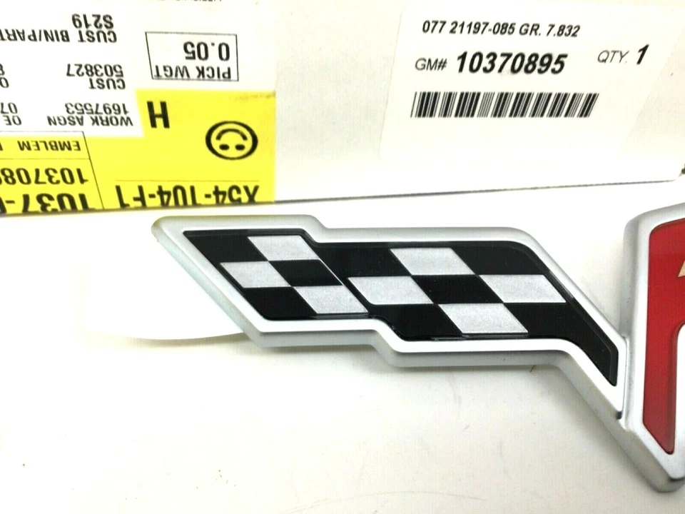 Chevrolet Corvette 2005-2008 parachoques delantero parrilla central bandera emblema insignia OEM Foto 2 de 4