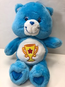 care bear with trophy on belly
