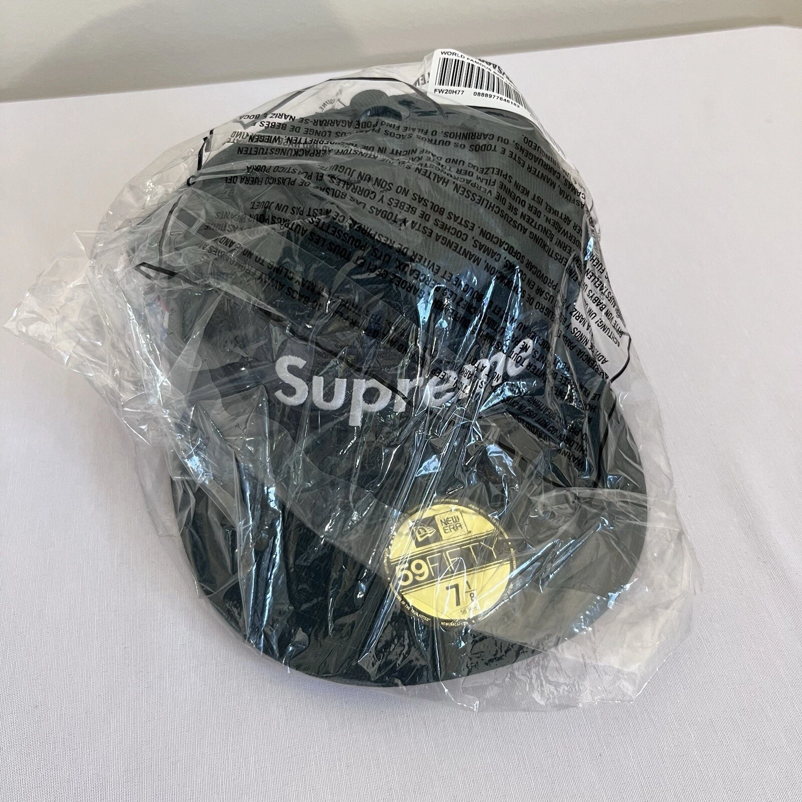 Logo boîte Supreme World Famous New Era   vert DK 7 1/8 neuf scellé
