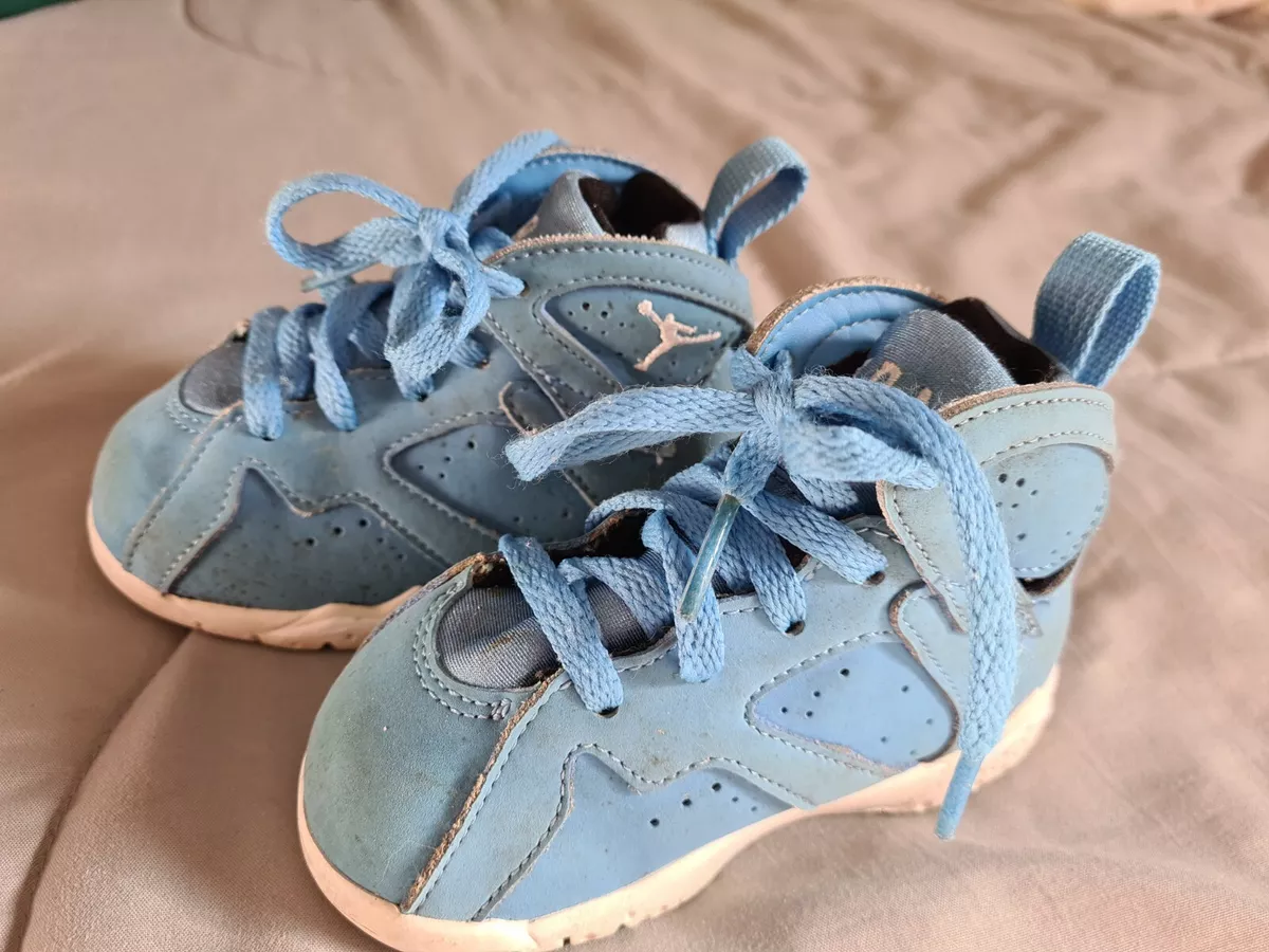 Baby blue sales jordan retro