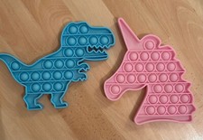 Dinosaur and Unicorn Popper toys