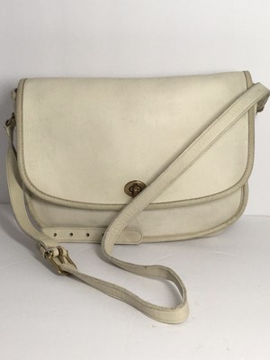 cream coach purse