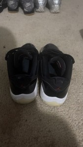 Jordan Air Jordan 11 Low Men’s Black/White Low Top Leather Lace-Up Sneakers