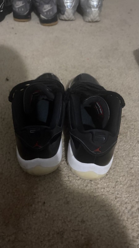 Jordan Air Jordan 11 Low Men’s Black/White Low Top Leather Lace-Up Sneakers